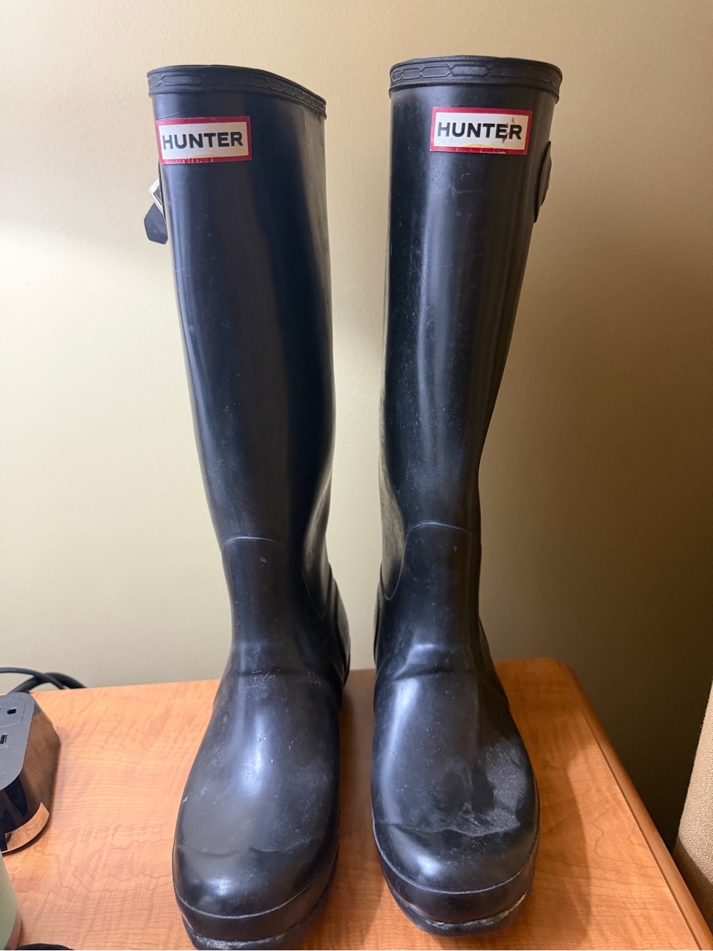 Tall black Hunter rain boots